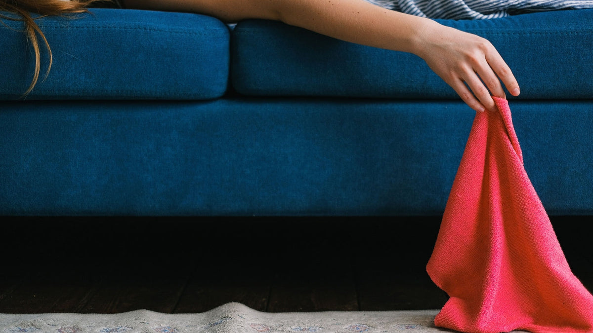 Arm resting over the side of a couch